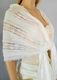 "-Ivory Lace Wedding Shawl, Bridal Wrap, Bridal Wedding Scarf, Lace Bridesmaid Shawl,Evening shawl and wrap,Party Dress Cover up-SF007 -- Many color lace shawl is perfect for brides and bridesmaids. this shawl is elegant and light weight cover up . Color: Ivory, White, Grey Made in U.S.A. and Handmade Please handwash only. **Measurement** Approximately 72\"Long x 16-18 \" wide" Fitted Shawl For Mother Of The Bride, Fitted Lace Shawl For Wedding, Fitted Wrap For Wedding, Elegant Wedding Wrap, Elegant Lace Trim Shawl For Weddings, Cream Pashmina Shawl For Wedding, Elegant Fitted Lace Shawl, Elegant Fitted White Shawl, Fitted Lace Wedding Shawl