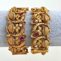 Ruby Gold Rajwadi Kundan openable Kada Bangle(1Pc)Single Kada/Indian Kada/Wedding Jewelry/Kada/Punjabi Jewelry/Indian Wedding Made from High-Quality Hand Picked Kundan Stone Sold as a single kada  Perfect Kundan bangles for Party Wear. The Look Is Stunning And Preciously Suitable For All Kinds Of Dressy Occasions Its a Ideal Gift for Your Loved ones, Wife, Mother, Sister, Friend, Excellent gift for Birthday, Anniversary, Wedding , Can be wear any party , wedding, Festivals and Celebrations etc. This is 100% Handmade jewelry. So Color, shades, texture displayed may slightly vary from the actual product due to digital image limitations. We request you to consider these minor variations. Please expect the possibility of some slight imperfections when buying hand made jewelry. If you have any Traditional Sets With Intricate Design For Festive Occasions, Traditional Festive Sets With Intricate Design, Diwali Kundan Traditional Wear With Intricate Design, Diwali Traditional Wear With Intricate Kundan Design, Traditional Cutdana Wear For Wedding, Elegant Ceremonial Bangle With Zari Work, Traditional Gold Sets With Peacock Design, Elegant Zari Work Bangle For Ceremonial Occasions, Festive Navratri Sets With Intricate Design