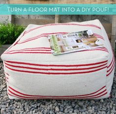 a red and white striped ottoman sitting on top of gravel covered ground with text overlay that reads how to turn a floor mat into a diy pouf