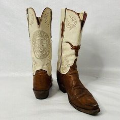 Longhorn stitched above toe, on shaft and University seal on the back. The boot leg is made from goat leather while the lower portion is made from smooth quill ostrich leather. I have conditioned these but they could use another round or two to fully bring them back to life. Ut University, Roper Cowboy Boots, Square Toe Cowboy Boots, Student Government, Lucchese Boots, Ostrich Boots, Vintage Cowboy Boots, Texas Longhorn, Roper Boots