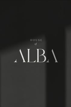 the house of alba logo is shown in white letters on a black background with shadows