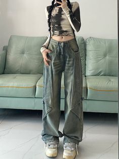 Venturing into the realm of avant-garde fashion, these jeans present an extraordinary statement with their oversized, ultra-wide-leg design. The faded blue denim is a nod to the classic, while the exaggerated silhouette pushes boundaries, making these jeans a piece for the bold at heart. The structured waistband and pockets retain a sense of traditional denim styling, but the paneled legs with their pronounced seams and cargo-style pockets introduce an urban utility vibe. These jeans are for tho Leg Patchwork, Jeans Women High Waist, Vintage Jeans Style, Denim Wide Leg Pants, Hipster Pants, Denim Decor, Loose Jeans, Type Of Pants, Jeans Women