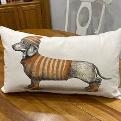 a pillow with a dachshund on it