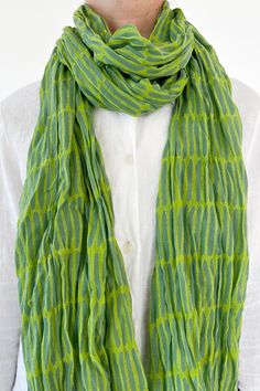 These 100% cotton scarves are the perfect accessory in any season. Experience the luxurious touch of soft, lightweight cotton scarves that add a splash of color to any outfit! From subtle patterns to bright, vibrant shades, these delicately crinkled cotton scarves will make you stand out — and do it in style. Transform your wardrobe with an order of these beautiful cotton scarves! They measure a generous 44 by 70 inches and can be easily styled in different ways. They come packaged twisted in a Patterned Scarves, Cotton Scarf, Black Khakis, Pink Yellow, Red Yellow, Unique Patterns, Color Splash, Black And Grey, Twist