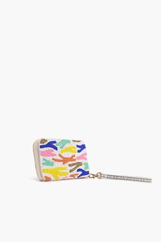 Our Rainbow Sprinkles Wallet is an elegant and versatile accessory designed to seamlessly blend style and functionality. This sophisticated Wallet is not just a fashion statement; it's a practical solution that combines a top zip compartment with an integrated wallet for all your essentials.The top zip closure provides a secure and convenient way to access your belongings. Keep your essentials safe and organized with easy access to the main compartment Hand Embellished with Top Zip Clutch Made i Trendy Travel Wallets With Zipper Closure, Trendy Travel Wallet With Zipper Closure, Modern Compact Wallet With Zipper, Trendy Rectangular Card Holder With Zipper Closure, Trendy Compact Coin Purse With Zipper, Trendy Compact Coin Purse With Zipper Closure, Trendy Coin Purse With Zipper Closure, Trendy Bifold Coin Purse With Zipper Closure, Trendy Multicolor Wallet With Zipper Closure