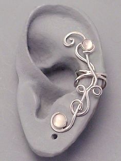 Sterling Silver Moonstone EAR CUFF MOONFLOWER by SunnySkiesStudio, $49.50...... this is the best one I've found Bohemian Sterling Silver Ear Cuff As Gift, Adjustable Sterling Silver Wire Wrapped Ear Cuff, Handmade Adjustable Sterling Silver Ear Cuff, Pierced White Sterling Silver Ear Cuff, Unique Sterling Silver Ear Cuff For Weddings, Wire Ear Cuffs, Wrap Earrings, Ear Cuffs, Diy Schmuck