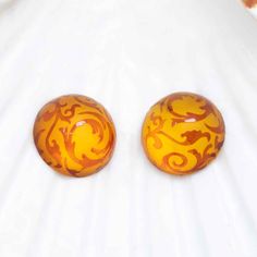 carved amber Elegant Amber Resin Jewelry, Elegant Carved Orange Jewelry, Bohemian Carved Amber Jewelry, Elegant Orange Resin Jewelry, Elegant Orange Carved Jewelry, Vintage Amber Carved Jewelry, Artisan Carved Amber Necklace, Artisan Amber Polished Beads, Gems, And Cabochons, Luxury Amber Agate Beads, Gems And Cabochons