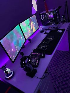 a desk with two computer monitors and headphones on it, in front of a purple background