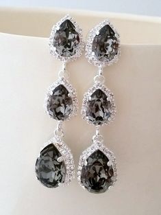 Smokey gray black diamond LONG Chandelier earrings, Drop earrings, Dangle earring Silver or Gold Swarovski, Bridal earrings, Bridesmaid giftTHIS IS "TINE ELDOR'S JEWLERY" ORIGINAL DESIGN!!THESE STUNNING EARRINGS CAN BE CUSTOM MADE WITH CUSTOM COLORS AND METAL PALTING. PLEASE CONTACT ME.Stunning beauty.These earrings are so romantic.  They would be great for bridal wedding or with evening dress. Perfect gift for bridesmaids or any other occasion.They are made of silver palted brass and Swarovski Gray Drop Earrings For Party, Gray Dangle Jewelry For Party, Gray Dangling Jewelry For Parties, Black Dangle Chandelier Earrings For Wedding, Gray Dangle Jewelry With Matching Earrings, Bridal Chandelier Earrings, Silver Bridal Earrings, Bridal Earrings Chandelier, Long Chandelier