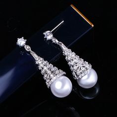 CZ Jewelry- Elegant Women Simulated Pearl Jewelry For Party Gift Big Crystal Stone Paved Silver Color Long Dangle Drop Earrings Model Number:32882237302 Earrings Size : 4.2 cm Brand : Pera Jewelry Item Type : Luxury Women Party Earrings For Gift Material : Cubic Zirconia Main Colors : White Earrings Model, Jewelry Elegant, Party Earrings, Cz Jewelry, Big Earrings, Women Party, Crystal Stone, Ladies Party, Luxury Women