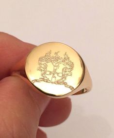 "crest signet ring - Pinky ring - mens signet ring - engraved ring - family crest - Personalized Ring - Best quality 18k Gold Plate - Signet ring. Special engraving technique using which create the appearance of crest or other images of your choice. Please note in the \"notes to seller\" at checkout. : * your ring size * letter / picture / name/s / Sentence / Inspiration / Drawing / crest - you want me to engrave If you have any questions please feel free to contact The product will arrive to yo Heirloom Signet Ring With Coat Of Arms, Formal Signet Ring With Coat Of Arms, Gold Signet Ring With Coat Of Arms, Anniversary Signet Ring With Coat Of Arms, Anniversary Coat Of Arms Signet Ring, Oval Signet Ring With Coat Of Arms For Gift, Coat Of Arms Signet Ring Gift, Oval Engraved Ring With Coat Of Arms, Gift Signet Ring With Coat Of Arms