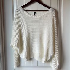 Moon & Madison. New Without Tags. Size L. Off White. Wide Scoop Neck. 3/4 -Full Dolman Sleeves. Ribbed Light Knit. Contrasting Knit Hem & Cuffs. 100% Acrylic. Machine Wash. Gorgeous, Light, Airy Sweater! Pair W/Shorts, Pants, Jeans, Skirts, Etc. Very Versatile & Perfect For This Spring/Summer! Measurements Are: 21.5-22” Long 29” Pit To Pit 29” Waist 16” Sleeves White Knit Sweater With Batwing Sleeves, Trendy White One Size Tops, White Batwing Sleeve Top For Winter, White One Size Tops For Fall, One Size White Tops For Fall, White Cozy Batwing Sleeve Tops, Cozy White Batwing Sleeve Tops, White Batwing Sleeve Cozy Top, Light Knit