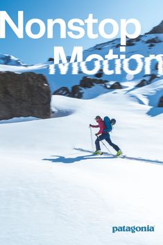 a person riding skis on top of a snow covered slope with the words nonstop motion