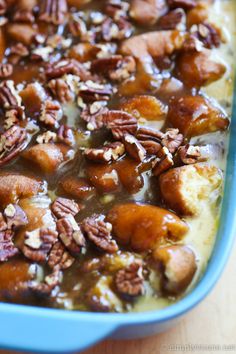 a casserole dish with pecans and nuts in it