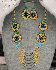 Beautiful set of necklace and handmade earrings by Mexican artisans. Multicolor Necklaces With Matching Earrings For Gifts, Bohemian Multicolor Jewelry Sets With Matching Earrings, Handmade Yellow Bohemian Jewelry, Multicolor Necklaces With Matching Earrings, Handmade Multicolor Dangle Earrings, Handmade Multicolor Dangle Jewelry, Multicolor Round Bead Necklaces With Matching Earrings, Bohemian Multicolor Necklaces With Matching Earrings, Multicolor Round Beaded Necklaces With Matching Earrings