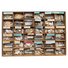 a wooden box filled with lots of different types of bread