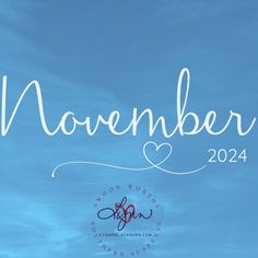 a blue sky with the words november written in cursive writing