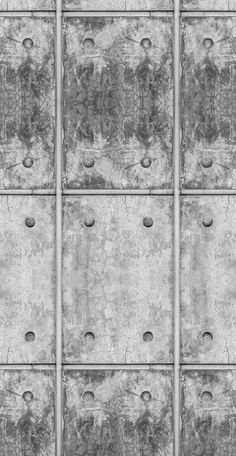 an old metal door with rivets on it