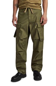 These loose-fitting, military-inspired twill pants feature roomy cargo pockets and woven tape inside the hems that can be adjusted to slightly taper the legs. Zip fly with button and drawstring closure Front slant pockets; side flap-patch zip pockets; back welt pockets 100% cotton Machine wash, line dry Imported Full Length Combat Cargo Pants, Combat Cargo Pants With Multiple Pockets, Combat Style Full-length Cargo Pants, Combat Style Wide Leg Cargo Pants, Khaki Combat Cargo Pants, Combat Style Wide Leg Cargo Pants With Multiple Pockets, Combat Parachute Pants With Cargo Pockets And Straight Leg, Combat Parachute Pants With Straight Leg And Cargo Pockets, Combat Style Straight Leg Parachute Pants With Multiple Pockets