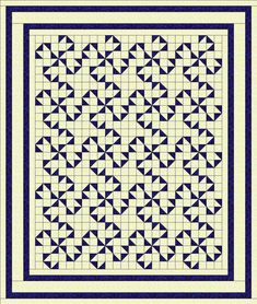 a blue and white quilt with black triangles on the front, along with a yellow border