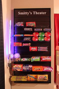 a display case with candy on it in a room