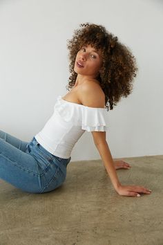 Calling all angels, the Lolita Off the Shoulder Ruffle Top is here for love. This crop top features a delicate off the shoulder sweetheart neckline, flutter sleeves, and twist front detailing. Available in white; pair this ruffle top with your go-to pair of Levi's! Details: 95% Polyester, 5% Spandex Elastic Neckline Fully Lined ome Stretch Hand Wash in Cold Water/ Line Dry White Off-shoulder Crop Top With Ruffles, Chic White Off-shoulder Top With Ruffles, White Strapless Flirty Top, White Flirty Strapless Top, Flirty White Strapless Top, White Ruffled Off-shoulder Top For Day Out, White Off-shoulder Top With Ruffles For Day Out, White Feminine Off-shoulder Top For Day Out, Fitted Off-shoulder Top With Ruffles For Day Out