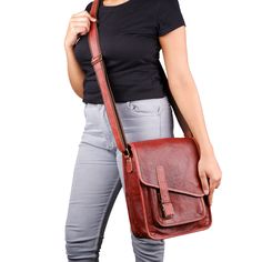 This beautiful dark brown crossbody leather bag is sure to help you ace your style game. This trendsetting piece from Classy Leather Bags will earn you compliments whenever you step out. The adjustable strap is an added advantage as it serves the purpose of a cross-body tablet bag as well as a shoulder bag. It is worn diagonally across the body for a carefree look or carried as a shoulder bag for a more sophisticated look. You can even use it as a purse. It has multipurpose central compartments Crossbody Laptop Bag, Messenger Bag Leather, Crossbody Leather Bag, Leather Ipad Case, Ipad Bag, Tablet Bag, Salford, Brown Crossbody, Leather Satchel Bag