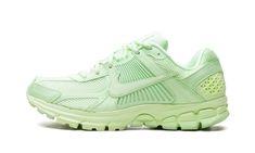 The Nike Zoom Vomero 5 “Pistachio” is a monochromatic pastel green colorway of the popular retro running shoe.  The Nike Zoom Vomero 5 debuted in 2010 and was later part of the Y2K-style sneaker trend that began in late 2022.  On the “Pistachio” colorway, the shoe features an all-Pistachio-colored appearance.  The base is designed in Pistachio mesh to match the hue of the synthetic leather overlays.  The “cage” on either side of the shoe that supports the lacing system also has a Pistachio finis Nike Zoom Vomero 5, Retro Running Shoes, Zoom Vomero 5, Vomero 5, Sneaker Trend, Spaghetti Strap Bodycon Dress, Plus Size Bodycon Dresses, Plus Size Bodycon, The Cage