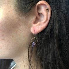 These birthstone earrings are simple, special and sweet. Rough cut amethyst gemstones dangle from a lightly hammered jump ring on handmade earring wires. Amethyst is the birthstone for February and symbolizes trust, spirituality and intuition. Length 3/4" Width 1/4" Dainty Purple Earrings With Ear Wire, Purple Dainty Earrings With Ear Wire, Everyday Purple Jewelry With Ear Wire, Everyday Purple Amethyst Earrings, Dainty Amethyst Dangle Earrings, Purple Gemstone Earrings For Everyday Wear, Everyday Purple Gemstone Earrings, Minimalist Purple Earrings With Ear Wire, Nickel-free Purple Earrings For Everyday