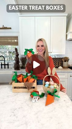 a woman sitting on top of a kitchen counter next to baskets filled with eggs and carrots