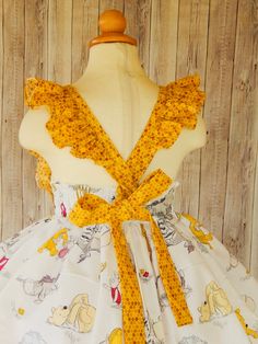 Winnie The Pooh Dress perfect for a birthday party or any occasion. Girls size 12-18 mo. 18- 24 mo. 2T 3T 4T 5T 6 7 8 I use an underskirt just to show how puffy is the dress. if you want a puffy look you will need to buy a under skirt and it sold separately. Please leave me a note with the following instructions. *Size Playful Fitted Princess Dress With Ruffles, Playful Fitted Ruffled Princess Dress, Fitted Princess Dress With Ruffles For Garden Party, Cute Ruffled Princess Dress For Birthday, Cute Princess Dress With Ruffles For Dress-up, Cute Princess Dress With Ruffles For Birthday, Whimsical Fitted Princess Dress With Ruffles, Whimsical Ruffle Twirl Dress For Playtime, Easter Birthday Dress With Ruffles