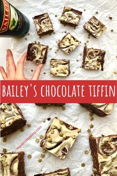 bailey's chocolate tiffins with white frosting on top and brownies in the middle