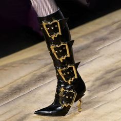 Elevate your style with our unique Gold Buckled Stage Boots - a true fashion statement that will make you stand out. These Women High Heeled Boots are designed to shine in every season, whether it's Autumn, Spring, or Winter. The Western-inspired design and pointed toe add a touch of sophistication and elegance to your look. Crafted with attention to detail, these boots feature a durable rubber outsole that provides both stability and comfort. The cotton fabric lining ensures that your feet stay comfortable and cozy, whether you're performing on stage or attending a party. The distinctive print pattern and versatile boot heights, both knee-high and short, allow you to express your individuality. The convenient zipper closure ensures easy wear and removal. The gold buckles on these PU (Poly Designer Heeled Boots With Buckle Closure For Fall, Designer Heeled Boots With Buckle For Fall, Luxury Pointed Toe Boots With Buckle Closure, Luxury Boots With Buckle Closure And Pointed Toe, Luxury High Ankle Boots For Party, Designer Boots For Night Out In Fall, Designer Heeled Boots For Fall Party, Fall Designer Party Heeled Boots, Luxury Pointed Toe Party Boots