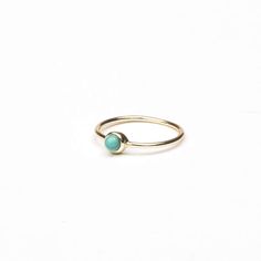 Turquoise natural stone gold plated 925 sterling silver ring for stacking with other rings. Very tiny and versatile to wear with any stack combinations. Gorgeous gold ring perfect for any occasion to get the boho look. Details: • Crafted in Gold plated .925 sterling silver. • Natural Dainty Gold Turquoise Gemstone Ring, Dainty Gold Turquoise Ring, Sterling Silver Turquoise Ring With Yellow Gold Gemstone, Turquoise Gemstone Ring In Yellow Gold Sterling Silver, Sterling Silver Turquoise Ring In Yellow Gold, Gold Sterling Silver Turquoise Promise Ring, Everyday 14k Gold Turquoise Jewelry, Everyday Turquoise 14k Gold Jewelry, Gold Stackable Turquoise Promise Ring