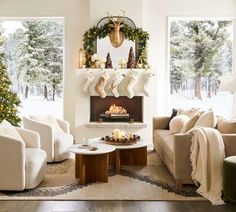 a living room filled with furniture and christmas decorations