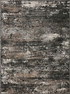 an area rug with different colors and textures