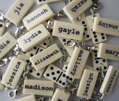 many different types of key chains with words on them