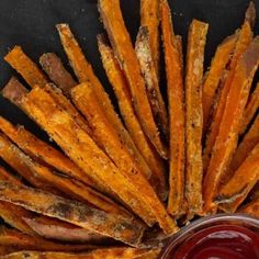 baked sweet potato fries with ketchup on the side