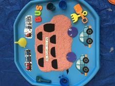 a child's play tray with cars on it