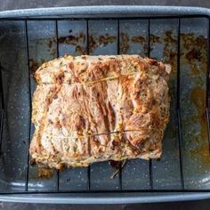 a piece of meat sitting on top of a grill