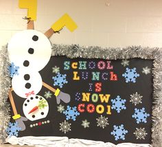 a bulletin board with a snowman on it