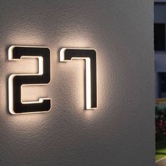 an illuminated sign with the number fifteen on it