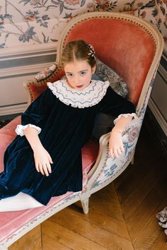 SIZE GUIDE : If you are hesitating between two sizes, we recommend going up one size (3M : newborn to 3 months ; 6M : 3 to 6 months ; 12M : 6 to 12 months ...) The perfect Christmas dress to look like a french Princess celebrating in Versailles ! - French elegant handmade 3/4 bishop Navy dress (variant available in red)- Large embroidered collar with Sun details, frills and French lace.- White covered back buttons- Double layer 100% cotton- Bloomer from 6M-24M- Match with our Red Celeste Bishop French Princess, Modest Winter Outfits, Wedding Flower Girls, Princess Clothes, French Kids, Girls Smocked Dresses, School Uniform Outfits, Smocked Dresses, Royal Babies