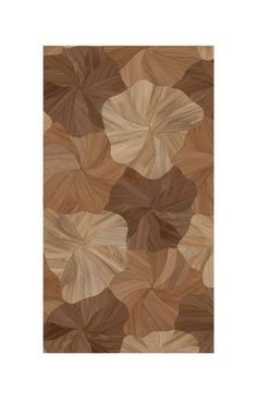 a brown rug with leaves on it