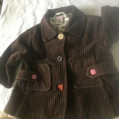 Gymboree cute as a button blazer jacket dress coat 12-18 mos  autumn thanksgiving holidays 12-18 M 12-18 months Gymboree caab blazer -cute as a button vintage piece EUC excellent could even be NWOT from vintage gymborees  fall autumn brown orange yellows line a brown cord corduroy blazer dress jacket dress coat  mutlicolored and different shaped buttons on it and  satiny lining with the line button print all over it fall colors great for valentines day birthdays family dinners weddings and more Thrift Ideas, Korea Trip, Red Pea Coat, Oc Outfits, Autumn Thanksgiving, Cute As A Button, High Fashion Outfits, Corduroy Blazer, Dress Coat