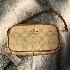 Never Used, Light Beige, Mini Bag Coach Beige Rectangular Bag, Coach Beige Clutch Bag, Elegant Coach Beige Coin Purse, Coach Cream Clutch Bag, Beige Coach Coin Purse, Beige Coach Shoulder Bag With Zipper Closure, Brown Rectangular Coach Coin Purse, Coach Mini Bag, Coach Clutch Shoulder Bag For On-the-go