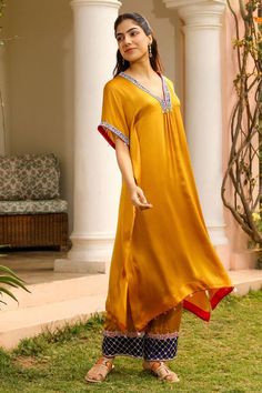 Mustard yellow kaftan featuring zardozi, resham and bead embroidered neck and sleeve hem. Pair with a straight pant and an inner. - Aza Fashions Floor-length Resham Embroidery Kurta For Summer, Bohemian Palazzo Set With Zari Work For Summer, Maxi Length Kaftan With Pallu For Festivals, Silk Kaftan For Summer, Bohemian Floor-length Traditional Wear For Eid, Summer Bohemian Palazzo Set With Zari Work, Maxi Length Pallu Kaftan For Festivals, Silk Anarkali Kaftan For Summer, Designer Wear Summer Palazzo Set Maxi Length