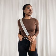 Add a little extra style and comfort to your favorite bag with our Woven Crossbody Strap. This handcrafted versatile strap features a minimal woven black-and-white pattern, making it easy to pair with any outfit. The full-grain leather accents and brass hardware add a touch of sophistication that elevates (wink wink) any outfit. Designed to pair perfectly with our crossbody bags, this strap is the perfect add-on to customize and infuse your bag with a touch of individuality. Not only does it add