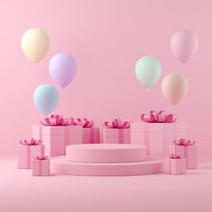 pink and white gift boxes with balloons floating over them