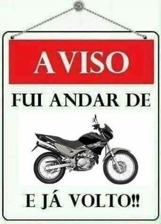 a red and white sign with a black motorcycle on it's back end that says, avso fu andar de eja volito